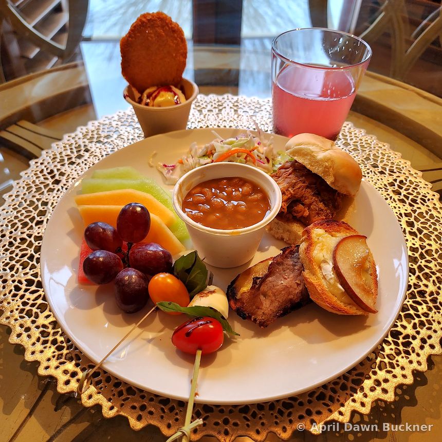A plated meal seen from above on a gold mat